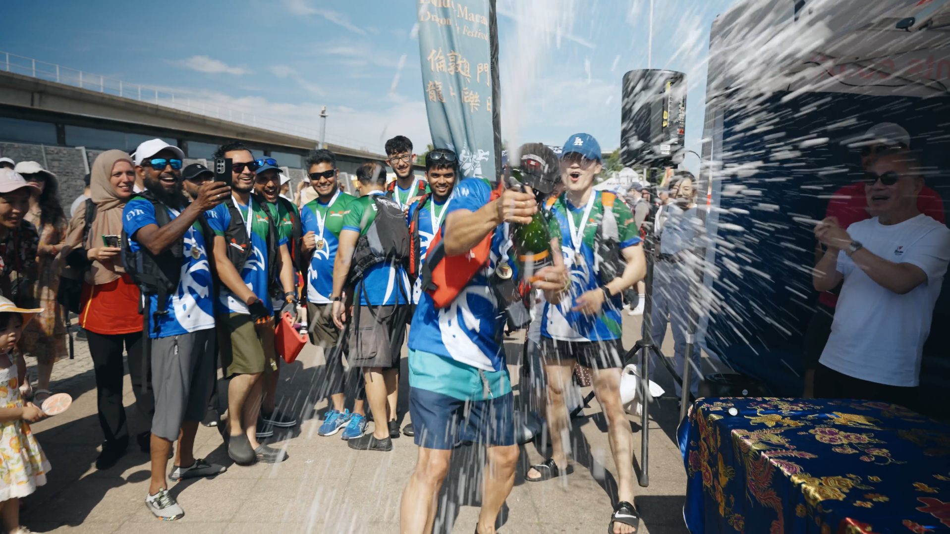 Champions celebrating with medals and champagne